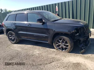 2019 Jeep Grand Cherokee Limited with VIN 1C4RJFBGXKC843402, listed as a Copart auction lot 57148265 with 96,615 mi miles and Salvage title. Bid and sale history available at DreamBid. Image 4.