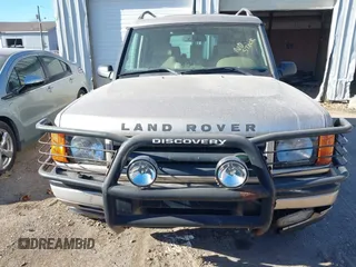 2000 Land Rover Discovery Cloth z VIN SALTY1247YA249969, wystawiony jako IAAI lot #42246445 z przebiegiem 188 643 mil mil oraz . Historia ofert i sprzedaży dostępna na DreamBid. Obrazek 6.