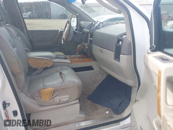 2004 Infiniti QX56 with VIN 5N3AA08C54N808162, listed as a IAAI auction lot 42040379 with 248,209 mi miles and . Bid and sale history available at DreamBid. Image 5.