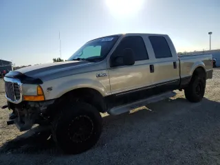 2000 Ford Super Duty F-250 XL with VIN 1FTNW21S9YEA79229, listed as a Copart auction lot 79939304 with 276,795 mi miles and Salvage Title. Bid and sale history available at carsss.com. Image 1.