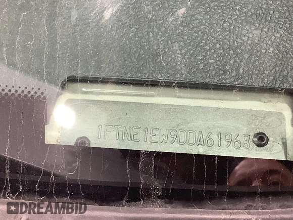 2013 Ford Econoline Cargo Commercial with VIN 1FTNE1EW9DDA61968, listed as a IAAI auction lot 42643038 with 121,719 mi miles and . Bid and sale history available at DreamBid. Image 10.