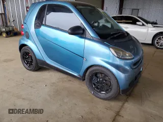 2009 Smart fortwo Pure with VIN WMEEJ31XX9K264071, listed as a Copart auction lot 55315705 with 117,006 mi miles and Salvage Title. Bid and sale history available at carsss.com. Image 4.