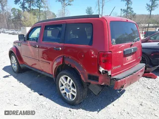 2010 Dodge Nitro SE with VIN 1D4PT2GK7AW142856, listed as a IAAI auction lot 41855687 with 197,248 mi miles. Bid and sale history available at carsss.com. Image 3.