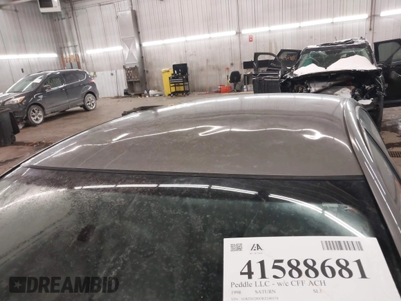 1998 Saturn SL z VIN 1G8ZH528XWZ240574, wystawiony jako IAAI lot #41588681 z przebiegiem Nie podano mil oraz . Historia ofert i sprzedaży dostępna na DreamBid. Obrazek 12.