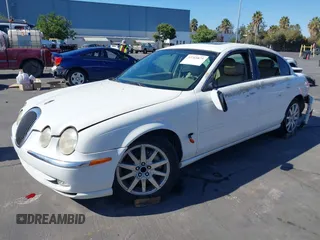 2000 Jaguar S-Type V8 with VIN SAJDA01D9YGL52238, listed as a IAAI auction lot 38743231 with Not Provided miles and . Bid and sale history available at DreamBid. Image 2.