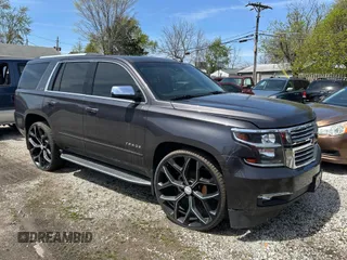 2015 Chevrolet Tahoe LTZ z VIN 1GNSKCKC9FR738998, wystawiony jako IAAI lot #42112162 z przebiegiem 193 600 mil mil oraz . Historia ofert i sprzedaży dostępna na DreamBid. Obrazek 1.