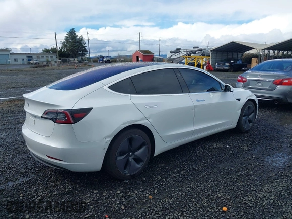 2018 Tesla Model 3 Long Range Battery with VIN 5YJ3E1EA3JF013253, listed as a IAAI auction lot 41752102 with 84,459 mi miles. Bid and sale history available at carsss.com. Image 4.