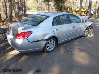 2006 Toyota Avalon XL with VIN 4T1BK36B46U147688, listed as a IAAI auction lot 41886568 with 210,581 mi miles. Bid and sale history available at carsss.com. Image 4.