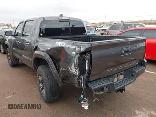 2018 Toyota Tacoma SR5 with VIN 3TMAZ5CN0JM061233, listed as a IAAI auction lot 41944668 with 94,314 mi miles and . Bid and sale history available at DreamBid. Image 14.