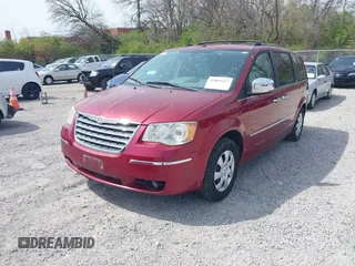 2010 Chrysler Town & Country Limited with VIN 2A4RR7DX2AR358067, listed as a IAAI auction lot 42065257 with 188,290 mi miles and . Bid and sale history available at carsss.com. Image 2.