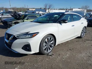 2023 Nissan Maxima Platinum z VIN 1N4AA6FV0PC513268, wystawiony jako IAAI lot #41986554 z przebiegiem 11 004 mil mil oraz . Historia ofert i sprzedaży dostępna na DreamBid. Obrazek 2.