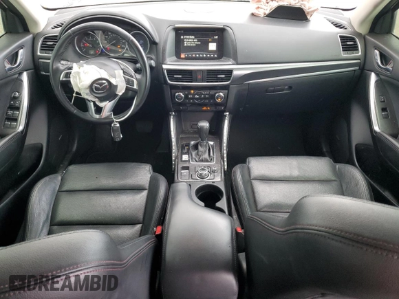 2016 Mazda CX-5 Grand Touring with VIN JM3KE2DYXG0784971, listed as a Copart auction lot 43865605 with 146,025 mi miles and Salvage Title. Bid and sale history available at carsss.com. Image 8.