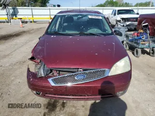 2006 Ford Focus S z VIN 1FAHP34N36W250236, wystawiony jako Copart lot #53794555 z przebiegiem 198 791 mil mil oraz Szkody całkowita. Historia ofert i sprzedaży dostępna na DreamBid. Obrazek 5.