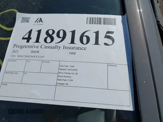 2021 BMW 5 Series 540i xDrive with VIN WBA73BJ03MWX30307, listed as a IAAI auction lot 41891615 with 27,374 mi miles and . Bid and sale history available at DreamBid. Image 19.