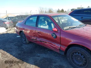 1998 Toyota Camry LE z VIN JT2BF22K6W0093402, wystawiony jako IAAI lot #41428561 z przebiegiem Nie podano mil oraz . Historia ofert i sprzedaży dostępna na DreamBid. Obrazek 6.