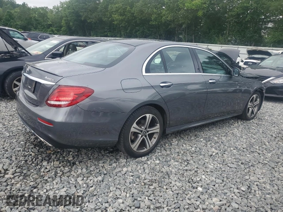2019 Mercedes-Benz E 300 with VIN WDDZF4KB7KA553856, listed as a Copart auction lot 61025735 with 59,001 mi miles and Salvage title. Bid and sale history available at DreamBid. Image 3.