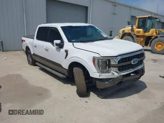 2021 Ford F-150 XL with VIN 1FTFW1E54MKD04591, listed as a IAAI auction lot 38292448 with 77,184 mi miles. Bid and sale history available at carsss.com. Image 1.
