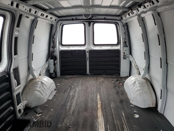 2018 Chevrolet Express Cargo z VIN 1GCWGAFG7J1906965, wystawiony jako Copart lot #56163435 z przebiegiem Nie podano mil oraz Szkoda całkowita • Salvage title. Historia ofert i sprzedaży dostępna na DreamBid. Obrazek 10.