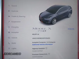 2016 Tesla Model X 70D with VIN 5YJXCBE24GF019450, listed as a IAAI auction lot 41517321 with 96,831 mi miles. Bid and sale history available at carsss.com. Image 7.