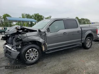 2019 Ford F-150 XL with VIN 1FTEW1EP2KFA58384, listed as a Copart auction lot 56124665 with 105,493 mi miles and Salvage title. Bid and sale history available at DreamBid. Image 1.