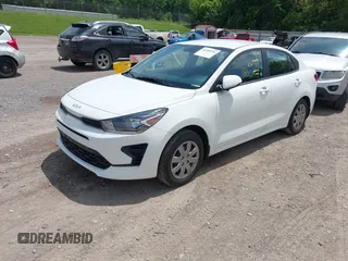 2023 Kia Rio S z VIN 3KPA24ADXPE613557, wystawiony jako IAAI lot #42198794 z przebiegiem 25 275 mil mil oraz . Historia ofert i sprzedaży dostępna na DreamBid. Obrazek 17.