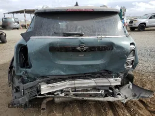 2022 MINI Countryman Cooper S z VIN WMZ53BR07N3N79750, wystawiony jako Copart lot #77675044 z przebiegiem Nie podano mil oraz Szkoda całkowita • Salvage title. Historia ofert i sprzedaży dostępna na DreamBid. Obrazek 6.