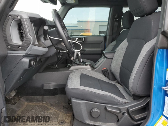 2023 Ford Bronco with VIN 1FMEE5BP5PLB60216, listed as a Copart auction lot 53698025 with 19,719 mi miles and Salvage title. Bid and sale history available at DreamBid. Image 7.