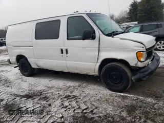1999 Ford Econoline Cargo with VIN 1FTRE1427XHB65677, listed as a Copart auction lot 88522945 with 301,567 mi miles and Salvage Title. Bid and sale history available at carsss.com. Image 4.