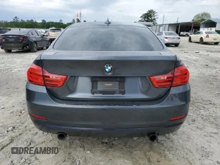 2015 BMW 4 Series 435i z VIN WBA4B1C59FG241125, wystawiony jako Copart lot #53889235 z przebiegiem 119 016 mil mil oraz Szkody całkowita. Historia ofert i sprzedaży dostępna na DreamBid. Obrazek 6.