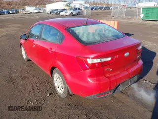 2015 Kia Rio EX with VIN KNADN4A36F6427415, listed as a IAAI auction lot 41671078 with 137,013 mi miles. Bid and sale history available at carsss.com. Image 3.