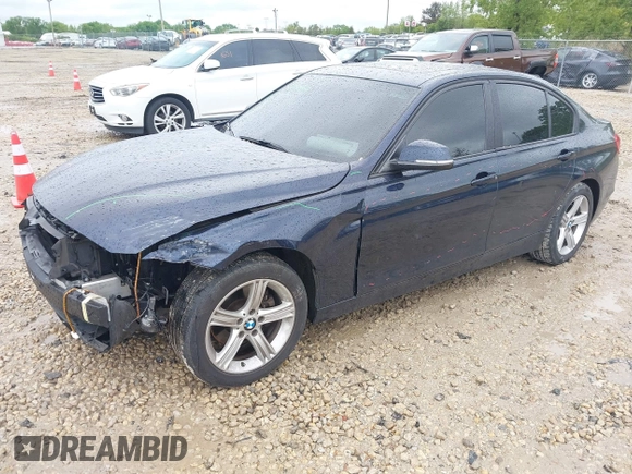 2013 BMW 3 Series 328i xDrive with VIN WBA3B3C50DJ698249, listed as a IAAI auction lot 42303923 with 130,527 mi miles and . Bid and sale history available at DreamBid. Image 2.