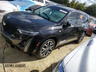 2021 Cadillac XT6 Sport z VIN 1GYKPGRS4MZ108084, wystawiony jako Copart lot #75632384 z przebiegiem Nie podano mil oraz Szkoda całkowita • Salvage title. Historia ofert i sprzedaży dostępna na DreamBid. Obrazek 1.