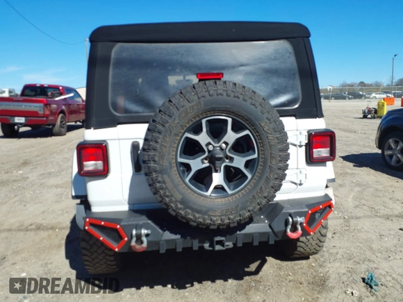 2023 Jeep Wrangler Rubicon with VIN 1C4HJXFG8PW655138, listed as a IAAI auction lot 41674959 with 40,790 mi miles and . Bid and sale history available at DreamBid. Image 16.