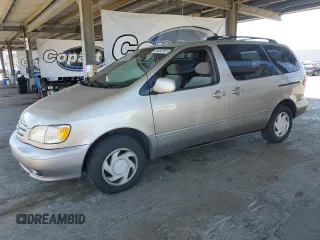 2002 Toyota Sienna LE with VIN 4T3ZF13C62U455029, listed as a Copart auction lot 63062565 with 216,485 mi miles and Salvage title. Bid and sale history available at DreamBid. Image 1.