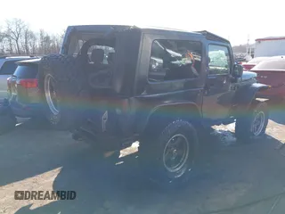 2007 Jeep Wrangler Rubicon with VIN 1J8GA64197L116283, listed as a IAAI auction lot 41008968 with 215,388 mi miles and . Bid and sale history available at DreamBid. Image 4.
