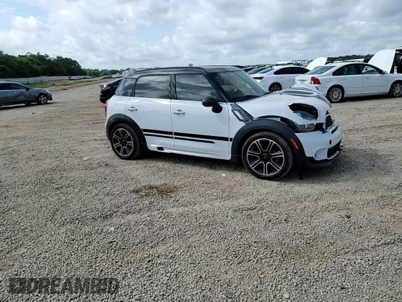 2014 MINI Countryman S with VIN WMWZC3C53EWP52333, listed as a Copart auction lot 54418495 with 34,687 mi miles and Salvage Title. Bid and sale history available at DreamBid. Image 13.