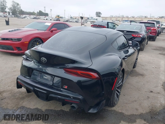 2021 Toyota Supra 2.0 with VIN WZ1DB2C07MW042723, listed as a IAAI auction lot 42635977 with 54,011 mi miles and . Bid and sale history available at DreamBid. Image 4.