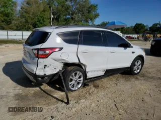 2018 Ford Escape SE with VIN 1FMCU0GD6JUA73082, listed as a Copart auction lot 50879005 with 148,900 mi miles and Salvage Title. Bid and sale history available at carsss.com. Image 3.