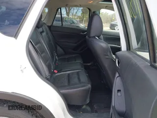 2014 Mazda CX-5 Grand Touring with VIN JM3KE4DY8E0397330, listed as a IAAI auction lot 41868116 with 180,891 mi miles. Bid and sale history available at carsss.com. Image 8.
