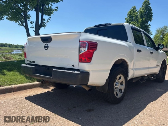 2017 Nissan Titan SV with VIN 1N6AA1EJ7HN539154, listed as a Copart auction lot 55880185 with 133,933 mi miles and Clean Title. Bid and sale history available at DreamBid. Image 4.