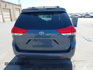 2014 Toyota Sienna XLE with VIN 5TDYK3DC5ES447155, listed as a IAAI auction lot 42003951 with 60,064 mi miles and . Bid and sale history available at DreamBid. Image 16.