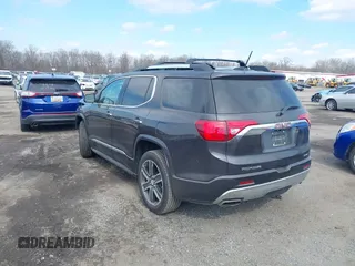 2019 GMC Acadia Denali with VIN 1GKKNXLSXKZ114736, listed as a IAAI auction lot 41679200 with 56,086 mi miles and . Bid and sale history available at carsss.com. Image 3.