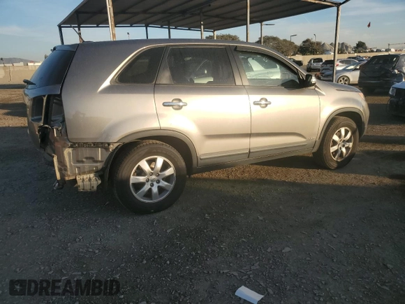 2012 Kia Sorento LX with VIN 5XYKTCA62CG255185, listed as a Copart auction lot 87242304 with 124,224 mi miles and Salvage Title. Bid and sale history available at DreamBid. Image 3.