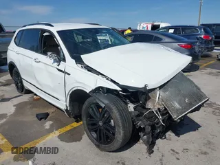 2022 Volkswagen Tiguan SE R-Line Black с VIN 3VVCB7AX9NM009779, выставлен на аукционе IAAI как лот 41696952 с пробегом Не указан миль и . История ставок и продаж доступна на DreamBid. Изображение 1.