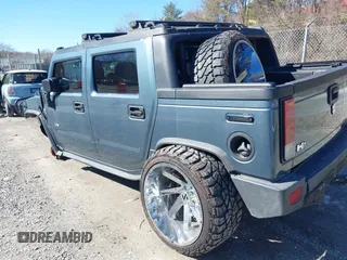 2005 Hummer H2 SUT with VIN 5GRGN22U85H107090, listed as a IAAI auction lot 41514241 with 202,119 mi miles. Bid and sale history available at carsss.com. Image 3.