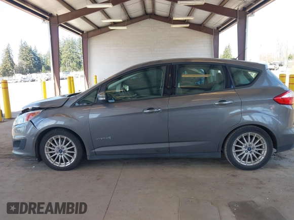 2013 Ford C-Max SE z VIN 1FADP5AU4DL556432, wystawiony jako IAAI lot #41703080 z przebiegiem 147 693 mil mil oraz . Historia ofert i sprzedaży dostępna na DreamBid. Obrazek 14.