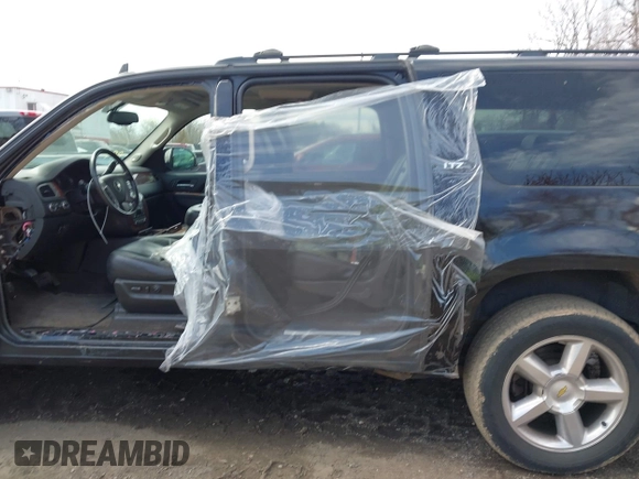 2010 Chevrolet Suburban LTZ with VIN 1GNUKKE31AR271504, listed as a IAAI auction lot 41870727 with 187,198 mi miles. Bid and sale history available at carsss.com. Image 14.
