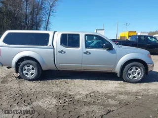 2007 Nissan Frontier SE with VIN 1N6AD09W97C423696, listed as a IAAI auction lot 42010577 with 117,096 mi miles. Bid and sale history available at carsss.com. Image 13.