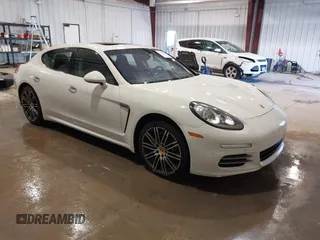 2016 Porsche Panamera 4 z VIN WP0AA2A71GL000087, wystawiony jako IAAI lot #41435476 z przebiegiem 103 537 mil mil oraz . Historia ofert i sprzedaży dostępna na DreamBid. Obrazek 1.