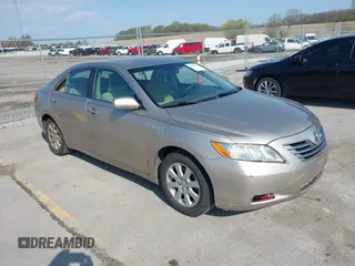 2007 Toyota Camry z VIN JTNBB46K473018895, wystawiony jako IAAI lot #42088421 z przebiegiem 400 223 mil mil oraz . Historia ofert i sprzedaży dostępna na DreamBid. Obrazek 1.